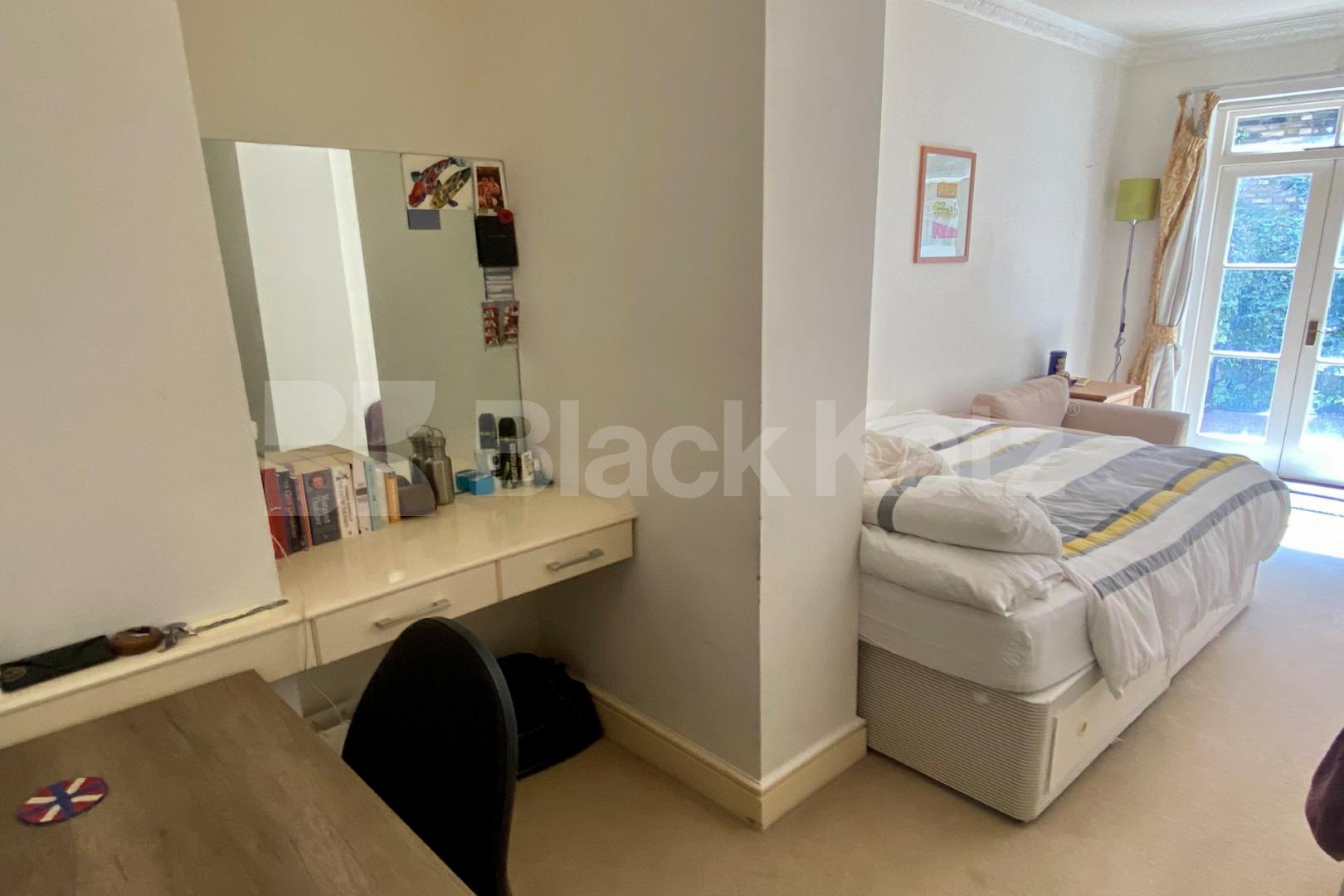 Spacious two bedroomed lower ground garden flat Alderney Street, Victoria / Pimlico